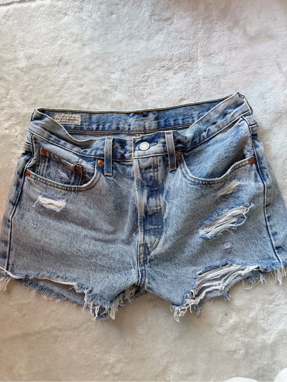 Levi’s Light Blue Wash Distressed Denim Shorts